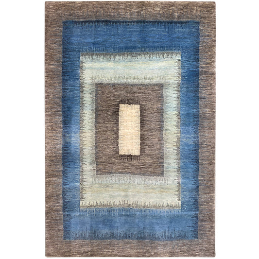 Gabbeh rug with a geometric pattern, blue-brown border, and cream-colored central relief