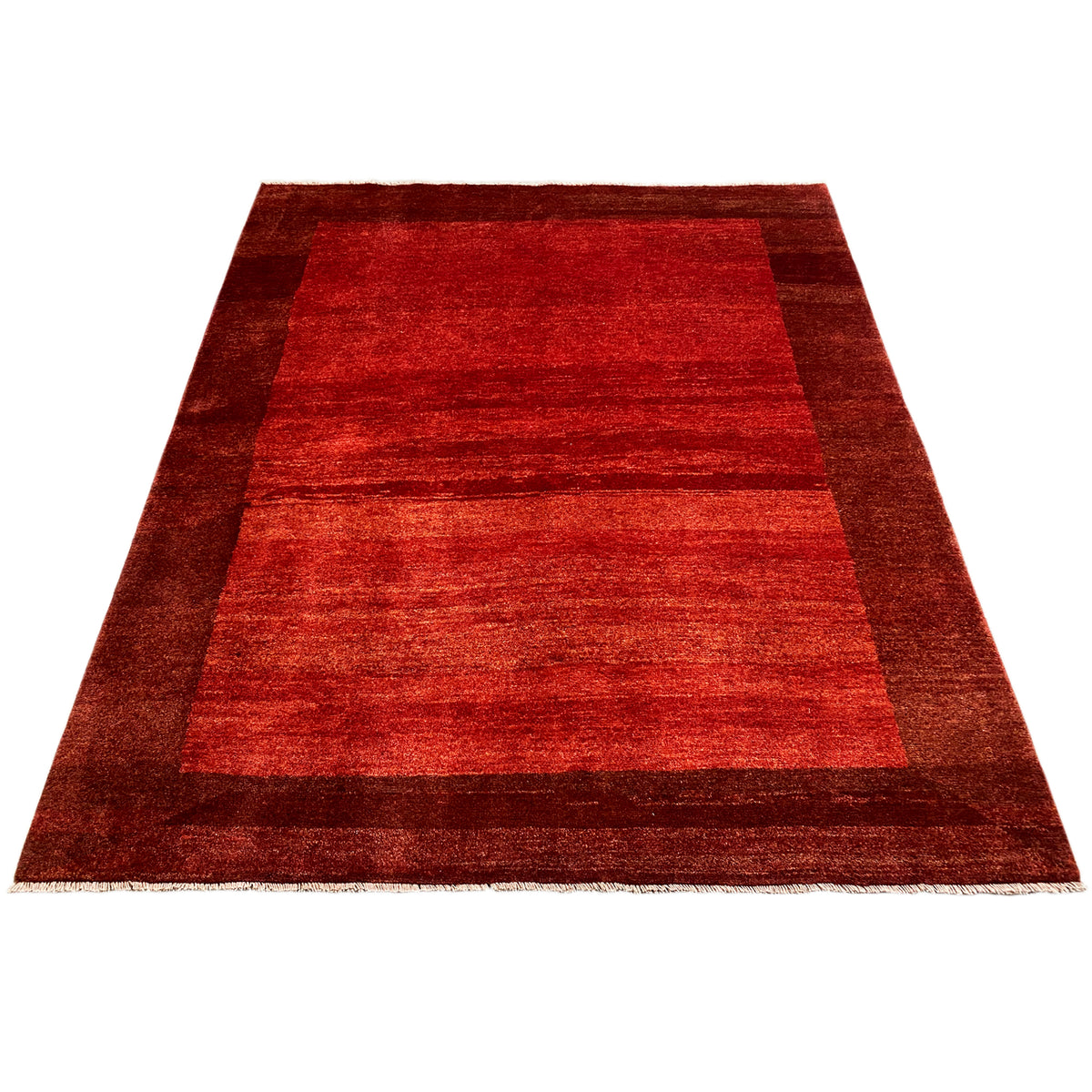 Red Gabbeh rug with a central stripe pattern and wide border edging