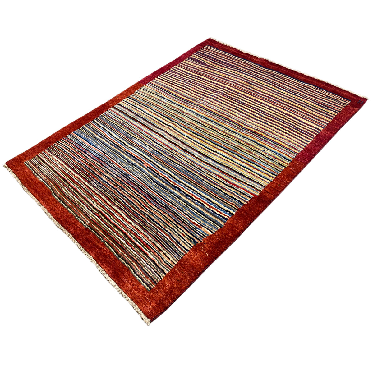 Carpet at an angle with narrow color stripes and a dark red border