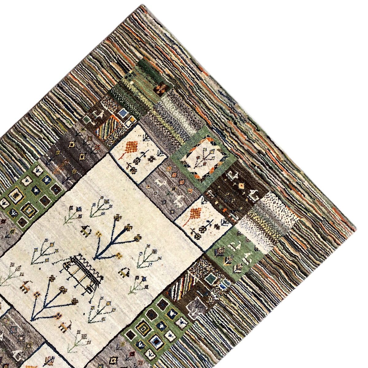 Gabbeh rug corner with border strips and a central field featuring a tree and house motif