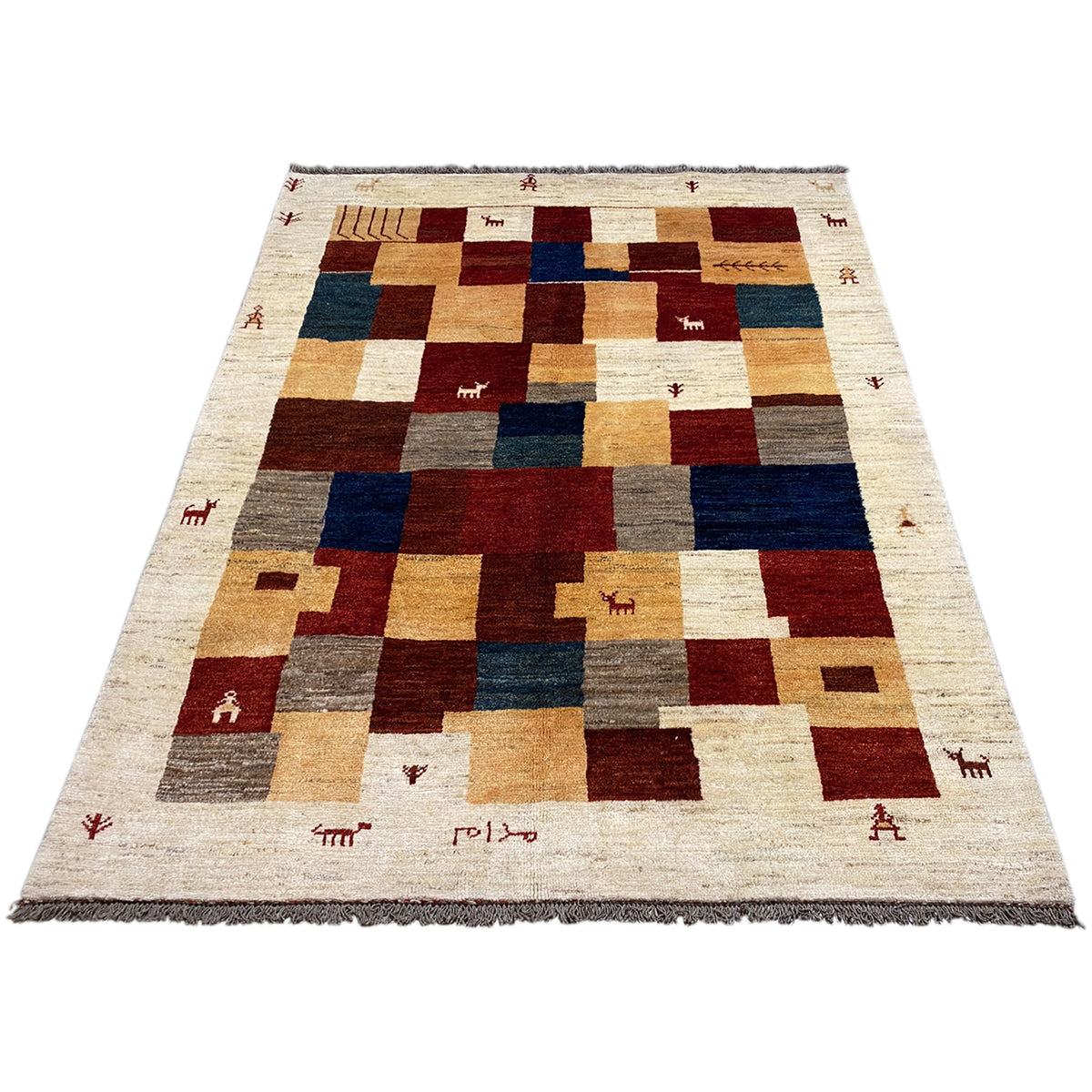 Large Gabbeh rug in a patchwork design in cream, red, blue, and brown