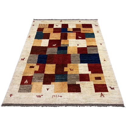 Large Gabbeh rug in a patchwork design in cream, red, blue, and brown