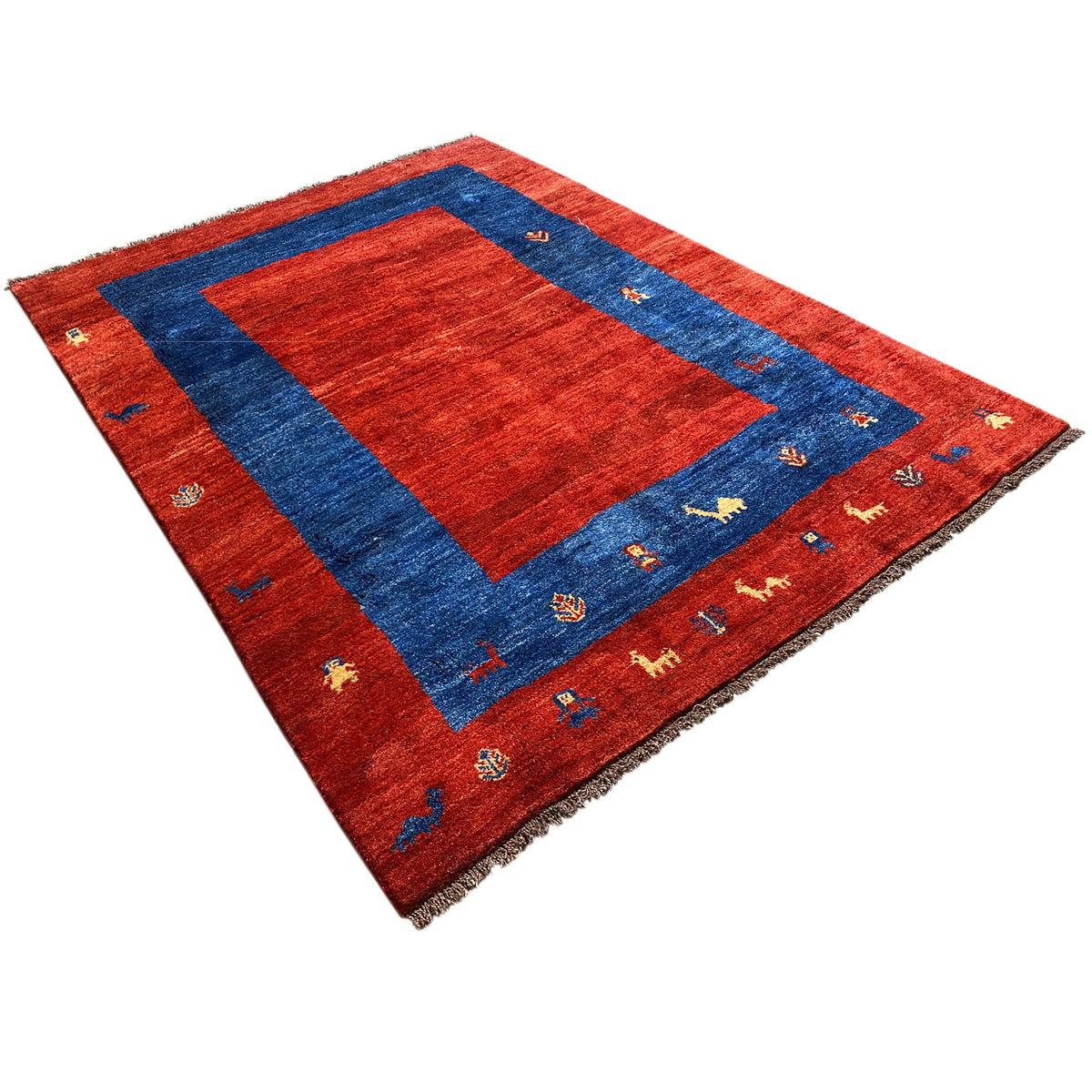 Gabbeh rug diagonal: red field with blue border and small multicolored motifs