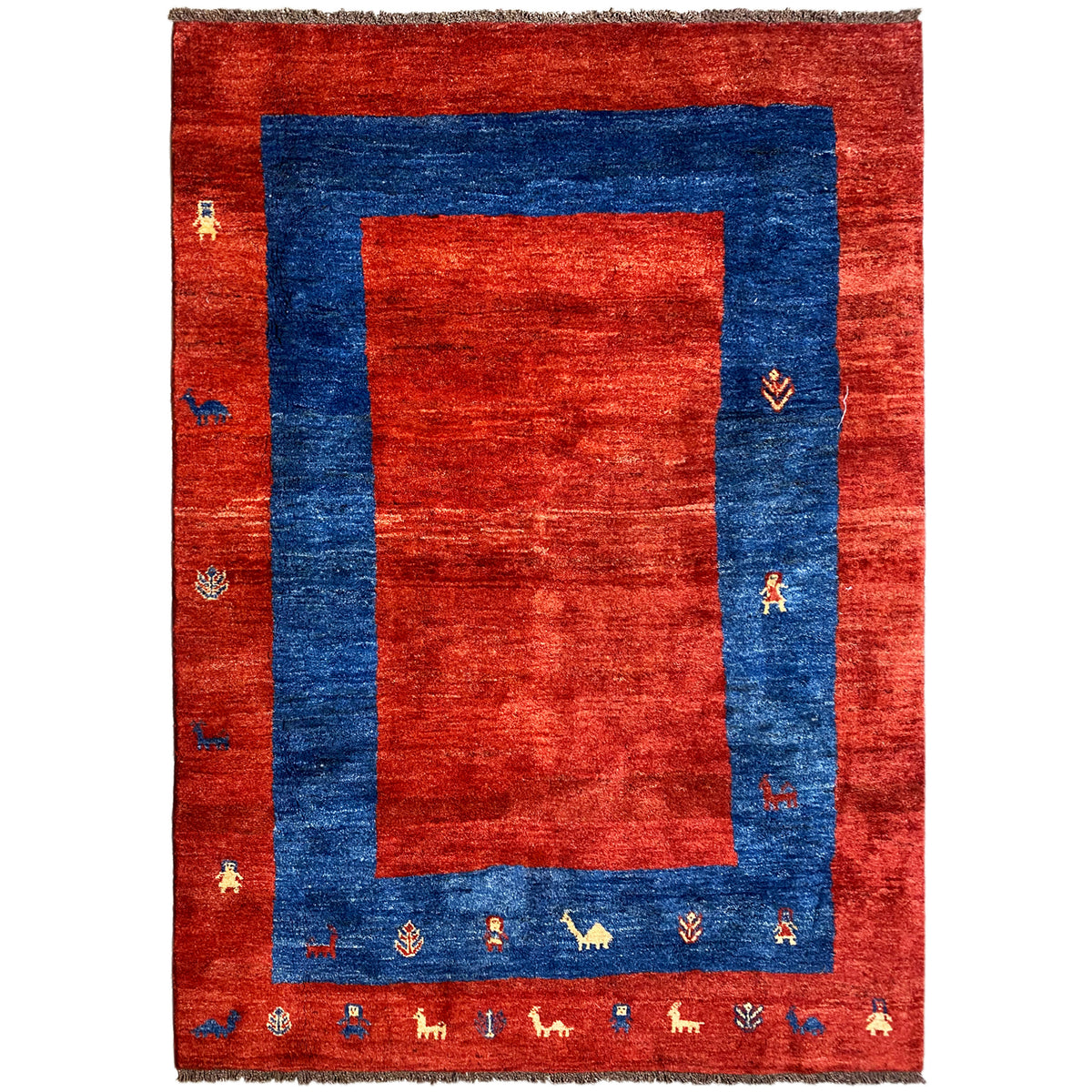 Gabbeh rug with a red background and blue border, intricate patterns and decorative edging