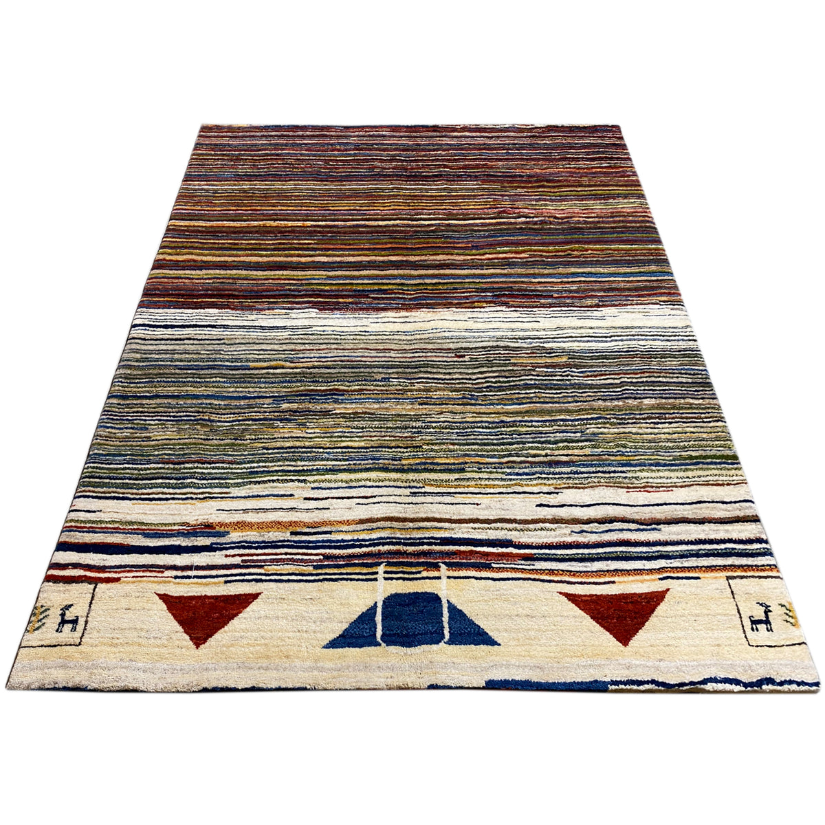 Gabbeh rug in triangular view: multicolored stripes at the top, border with symbols at the bottom