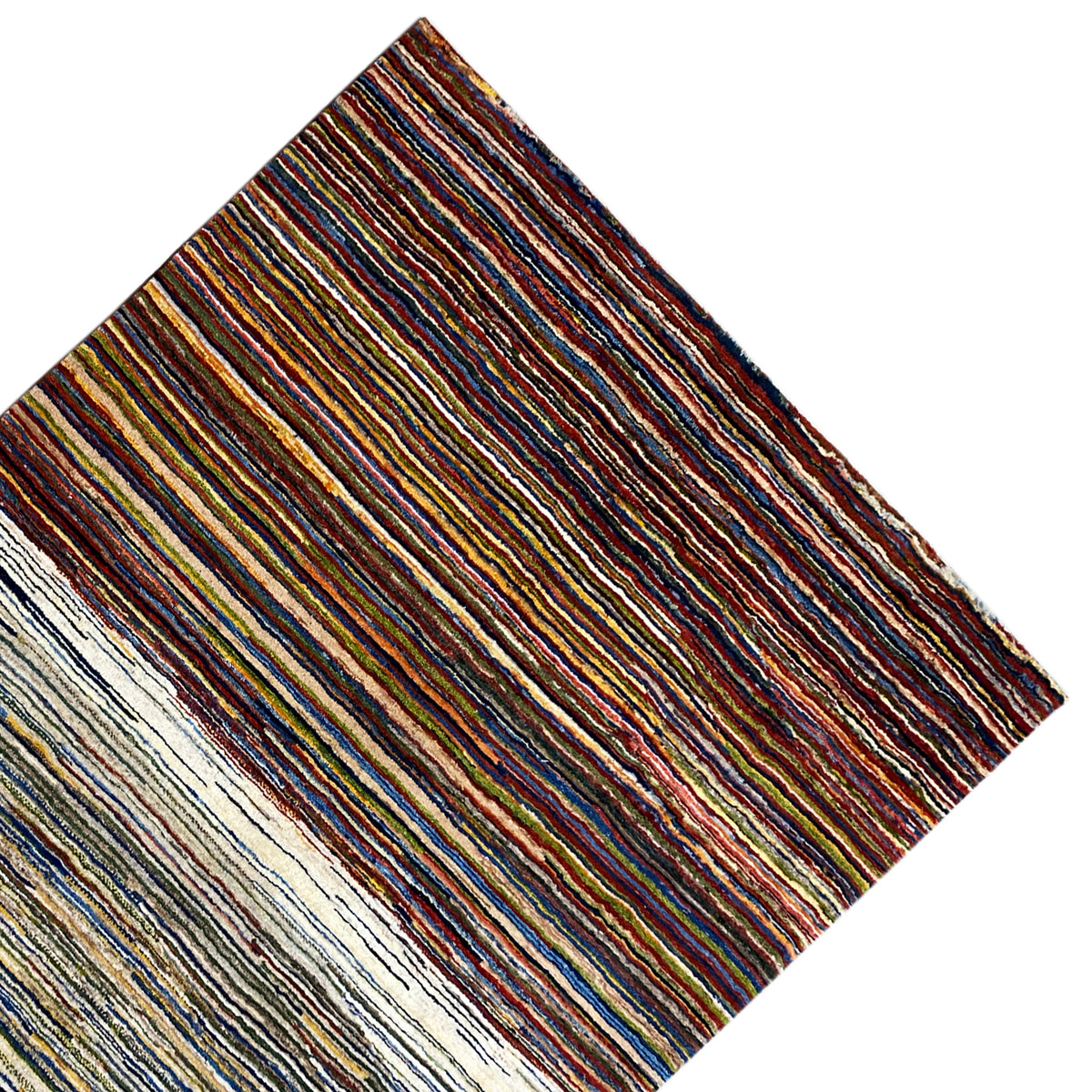 Gabbeh rug viewed from the side: multicolored stripes on a light background
