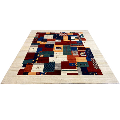 Rectangular Gabbeh rug with a beige border and geometric patchwork in blue and red
