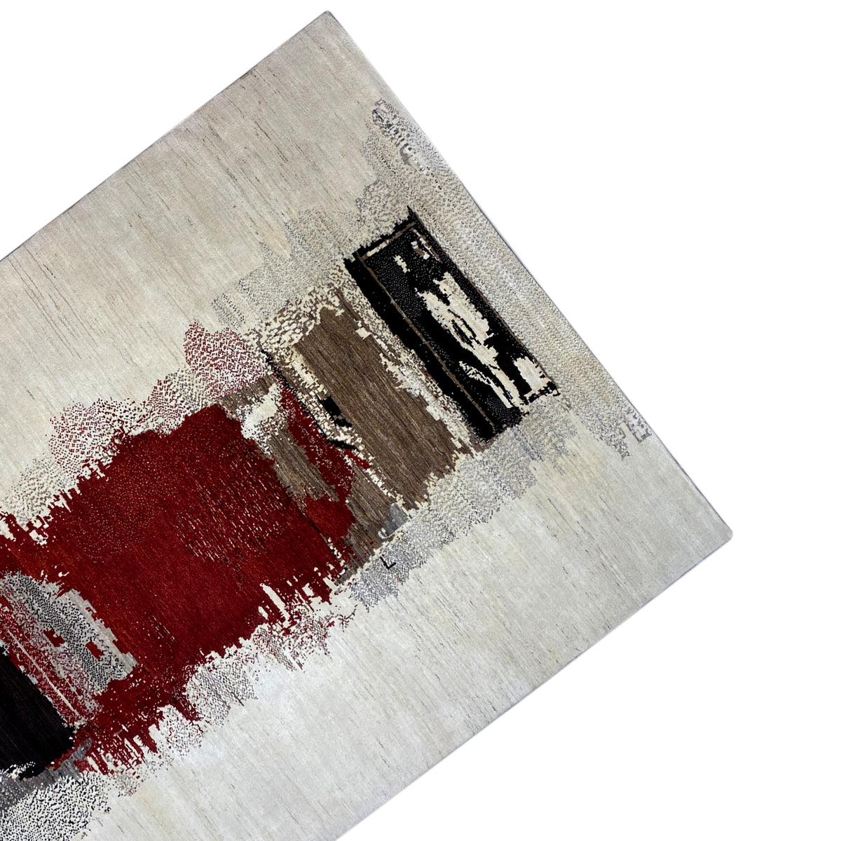 Gabbeh rug detail: red field, black accents, and gray flecks on beige