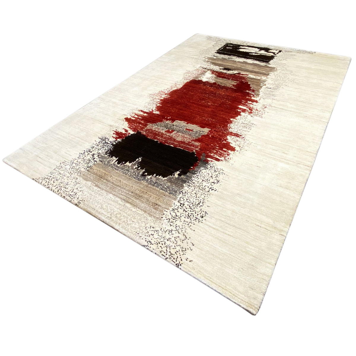 Beige gabbeh rug with a red stripe, gray speckles, and black cutouts