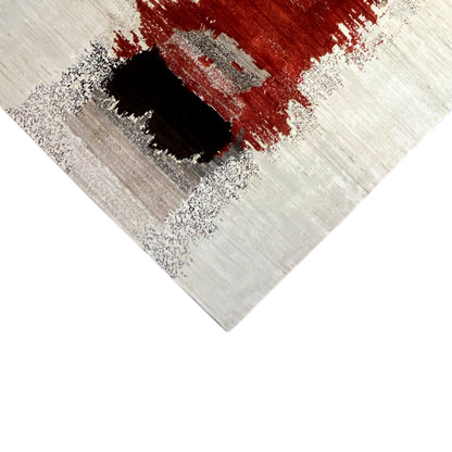 Gabbeh rug detail: black rectangle with a red bar on a light beige pile