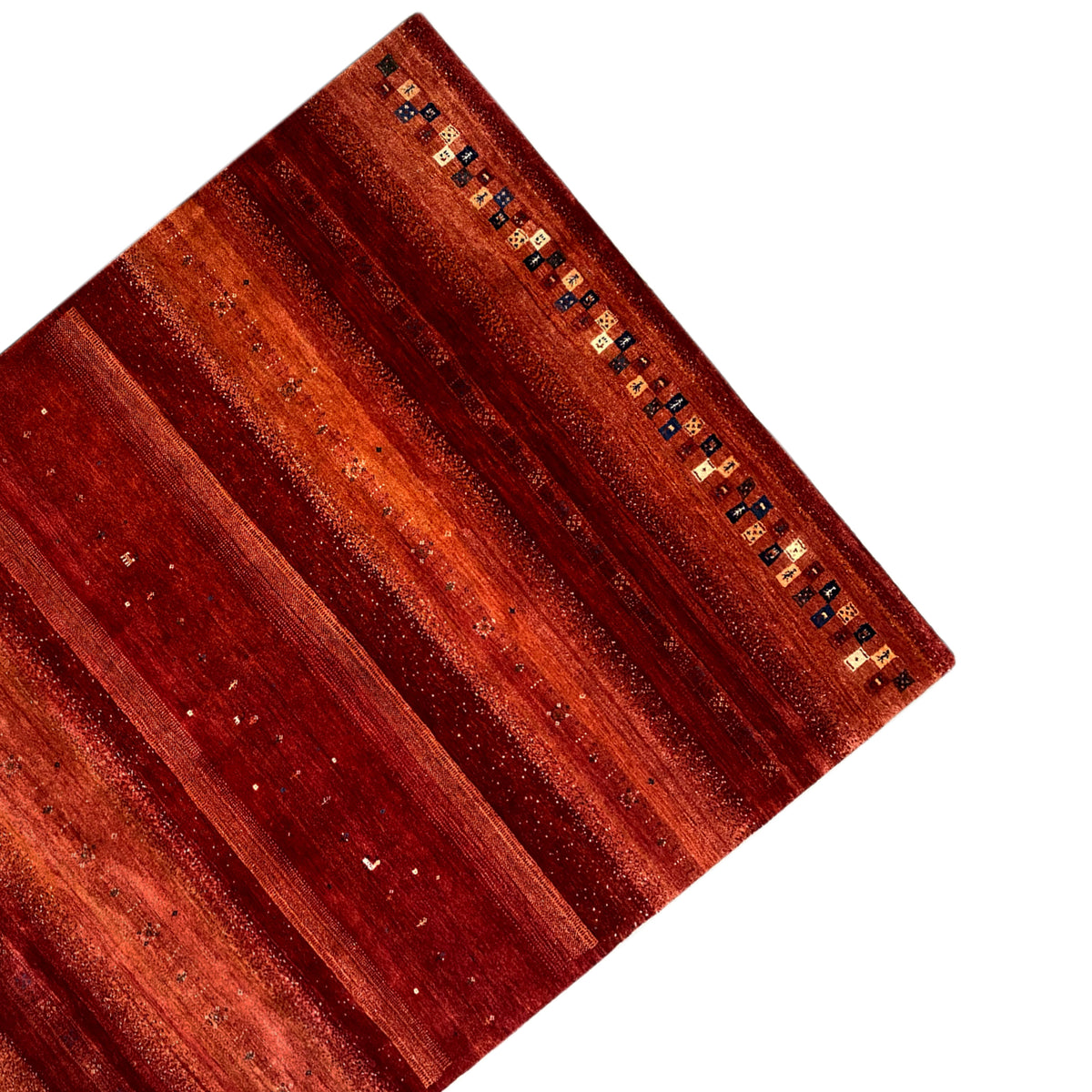 Red Gabbeh rug at an angle, wide stripes and small multicolored squares