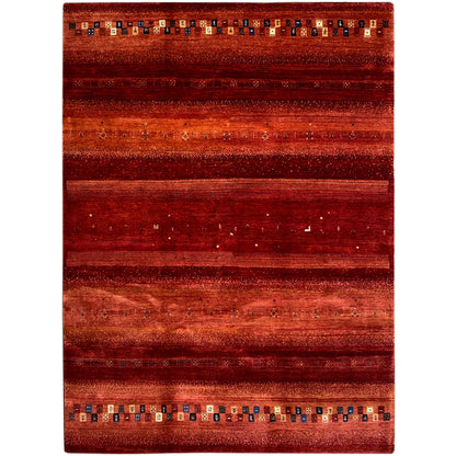 Red Gabbeh rug with wide stripes and colorful diamonds along the edges