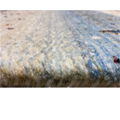 Close-up of the carpet surface with a nubby texture and light blue color gradients