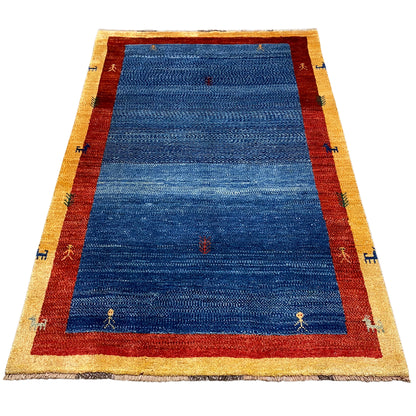 Carpet with a blue center, red border, beige edging, and fine lines
