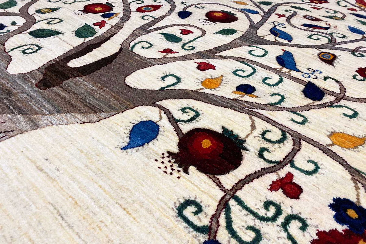 Close-up of the tree ornament: colorful floral patterns on a beige background