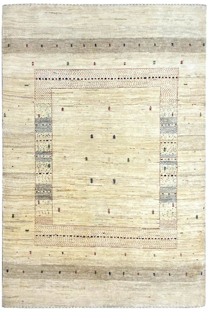 Gabbeh rug with a central square within a border, light beige appearance and colorful dots