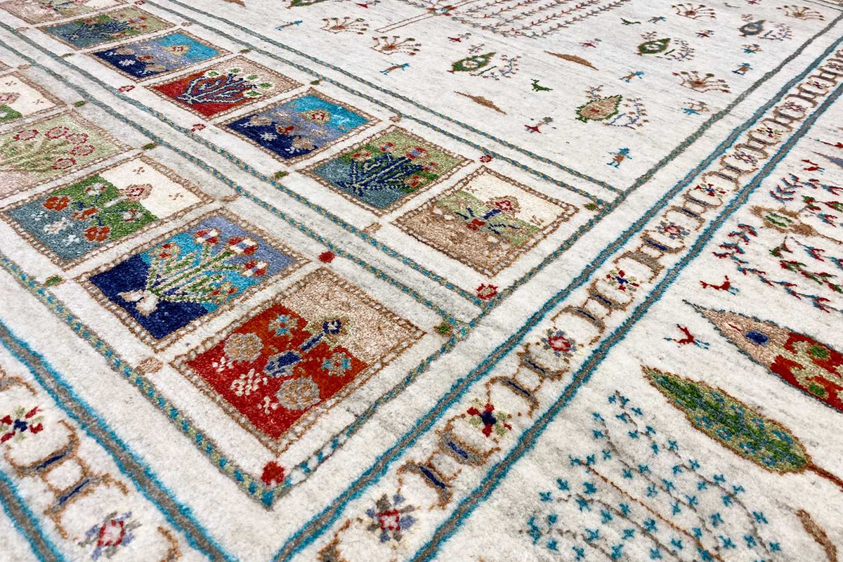 Gabbeh rug, detail with colorful square panels, geometric ornaments, and border