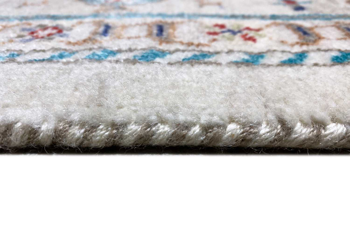 Gabbeh rug with a fluffy pile and fringes along the edge