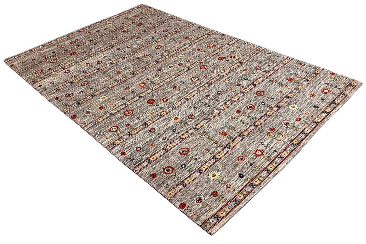 Gabbeh rug in a rectangular format, gray field with small colorful decorative elements