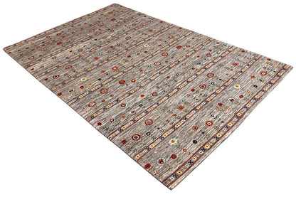 Gabbeh rug in a rectangular format, gray field with small colorful decorative elements