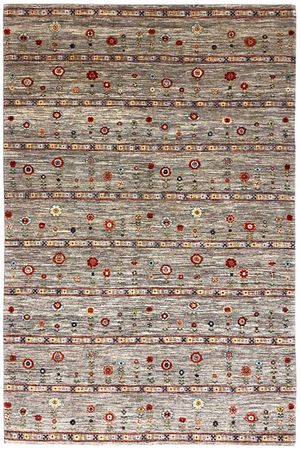 Gabbeh rug with a gray base and colorful circular and floral patterns