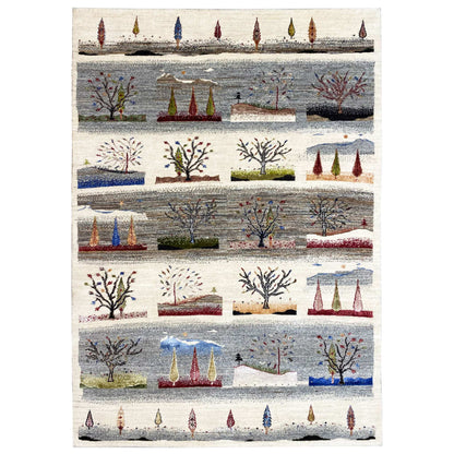 Gabbeh rug with a multicolored tree and tent motif on a light background