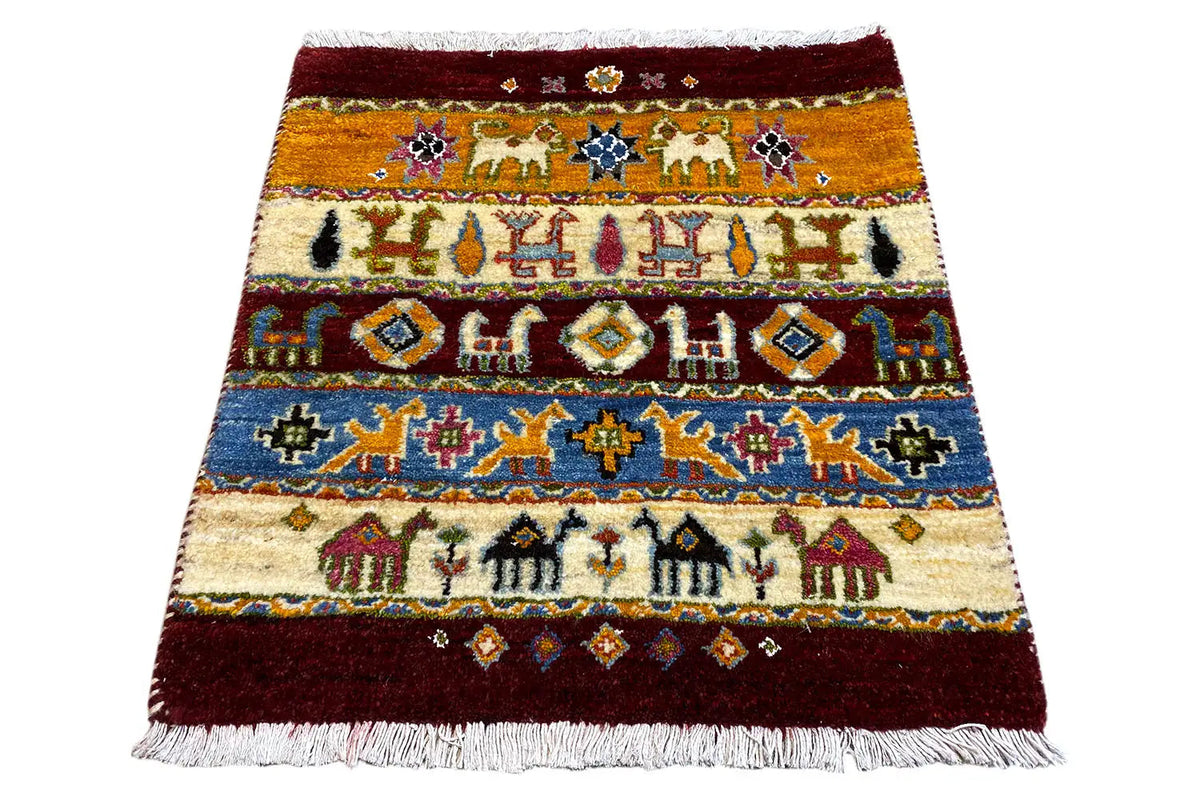 Gabbeh rug 63x58 cm with a cream-colored background, colorful row patterns, and fringes.