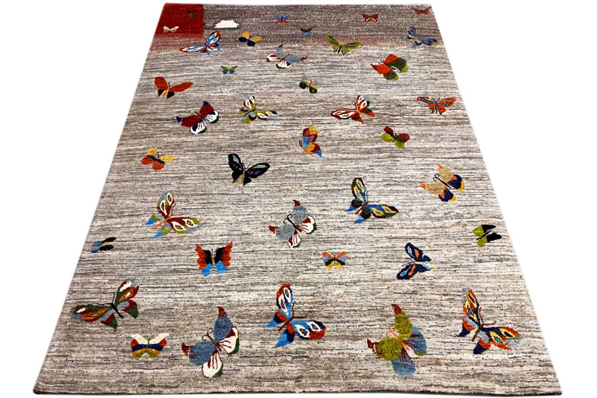 Gabbeh rug, spread out, light gray with colorful butterflies