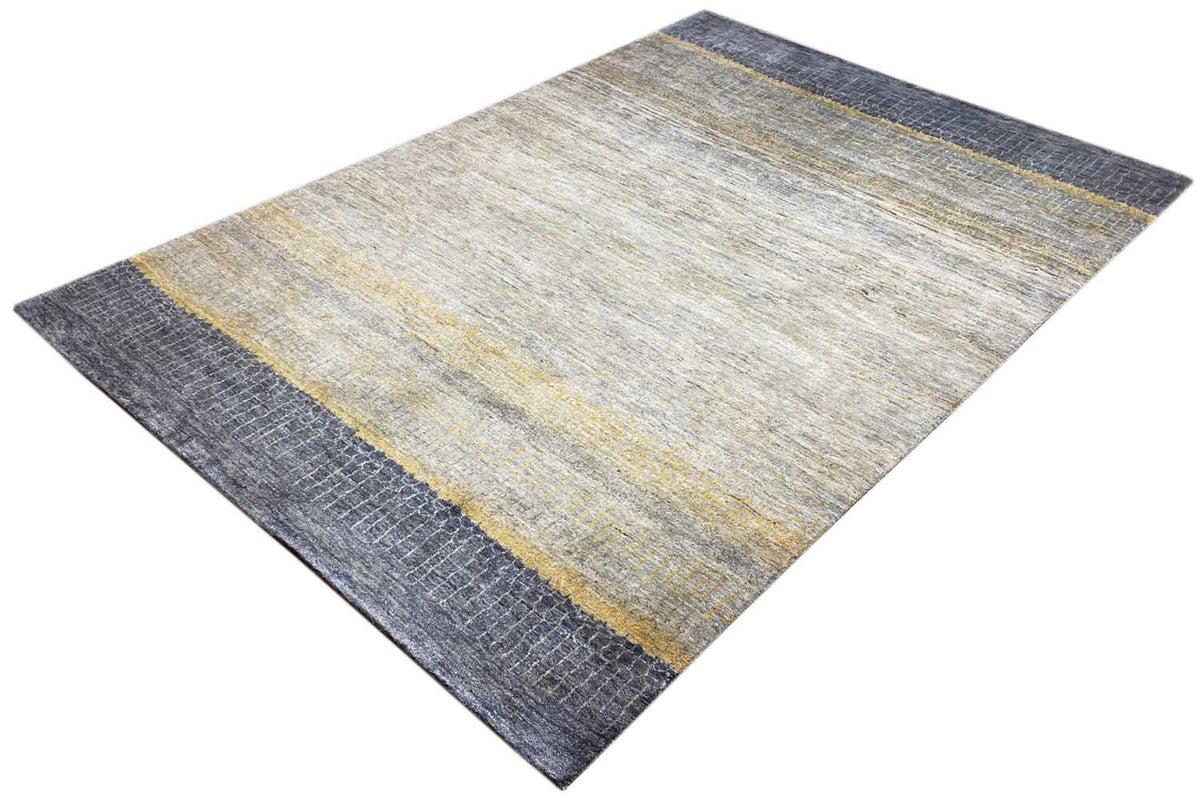 Gabbeh Lori rug with beige central sections and a blue border edged in yellow