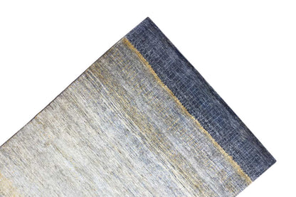 Gabbeh Lori rug with a blue border and yellow-outlined lines, rectangular