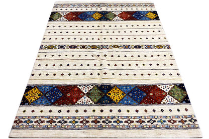 Rug with a cream-colored base, wide decorative stripes, and colorful squares