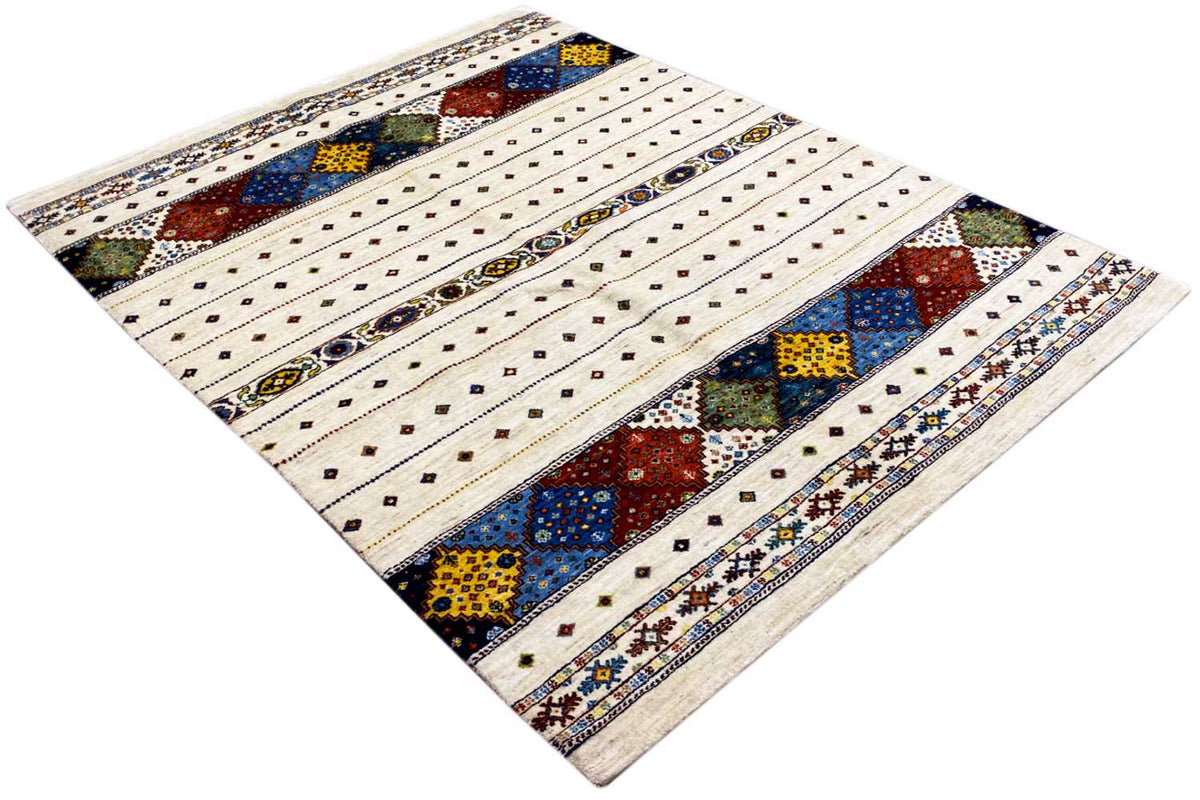 Gabbeh Lori rug laid diagonally, cream-colored field with colorful ornamental bands