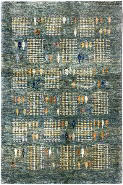 Gabbeh Lori rug with a blue-gray background and a square pattern in orange and white