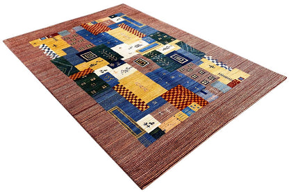 Gabbeh-Lori rug at an angle with multicolored blocks and fine borders