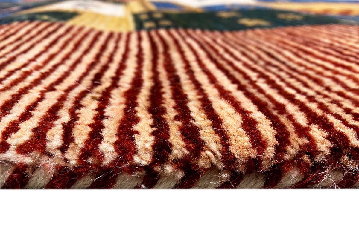 Gabbeh-Lori rug close-up of the woven pile in reddish brown and beige