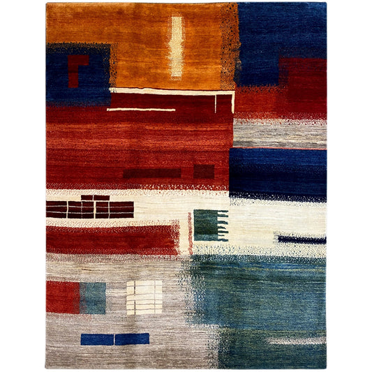 Gabbeh rug with a geometric pattern in blue, red, beige, and green