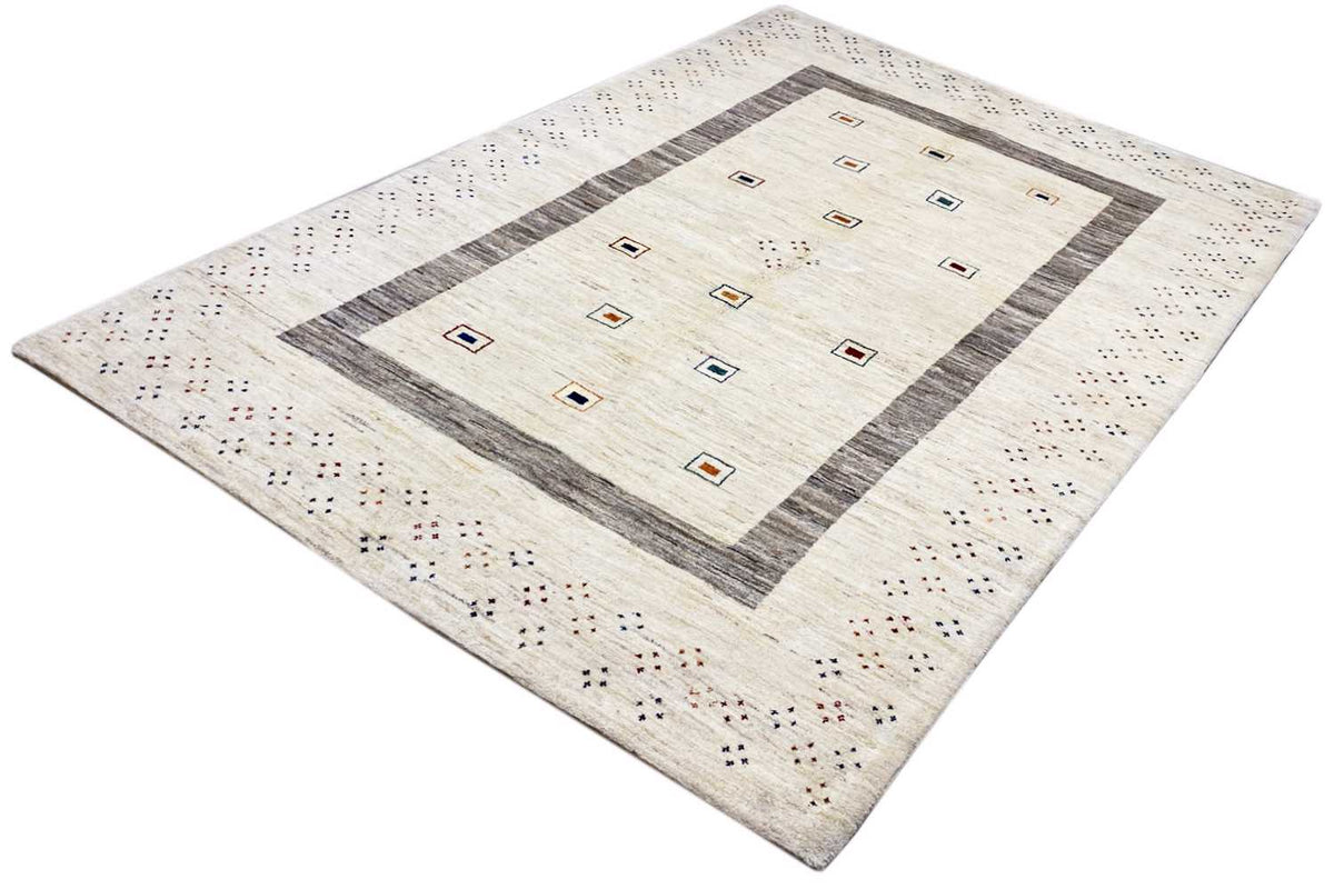Natural Gabbeh rug, beige pile with a gray border and colorful square motifs