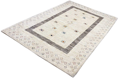 Natural Gabbeh rug, beige pile with a gray border and colorful square motifs