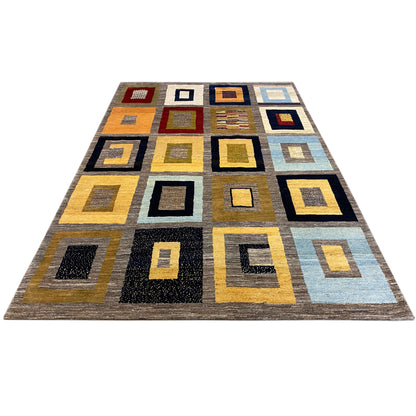 Rectangular Gabbeh rug with a geometric square pattern in shades of gray and yellow