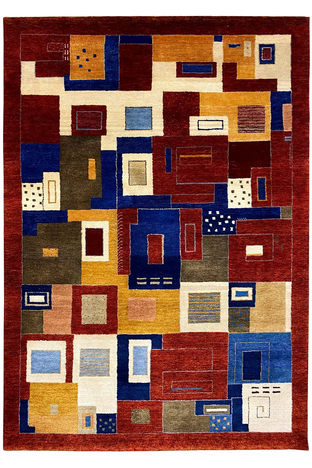 Oriental rug, patchwork pattern of red, blue, beige, and yellow areas with linear ornaments
