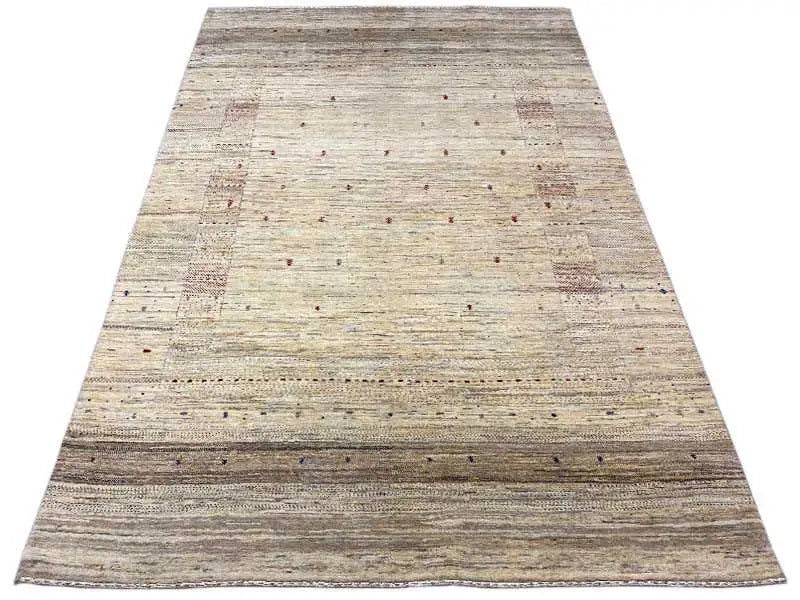 Gabbeh rug lying flat; light base with darker horizontal stripes