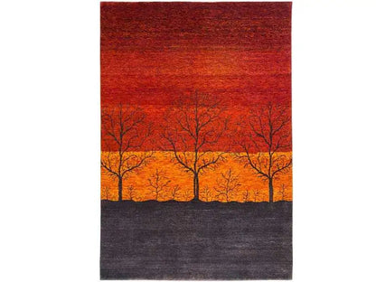 Gabbeh rug 200x141 cm, design featuring trees between an orange-yellow sky and dark ground