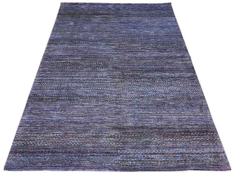 Gabbeh rug Lori, photographed at an angle, blue-violet texture