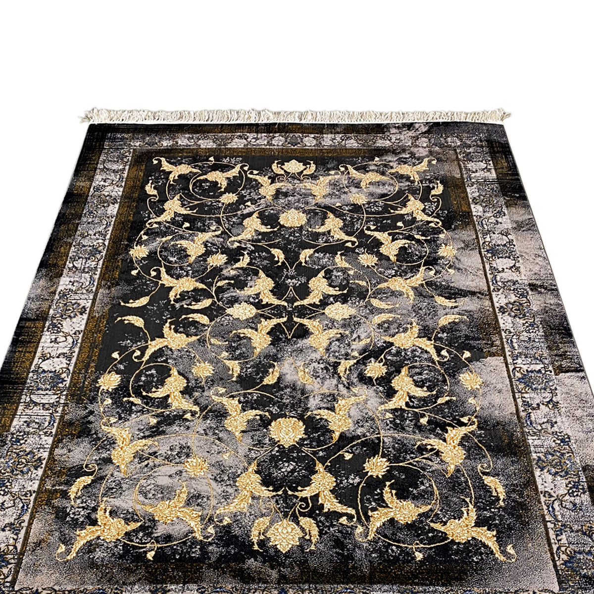 Kenza rug 160x230 cm: close-up of the floral gold pattern on a dark background