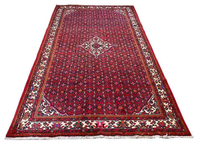 Hamedan oriental rug, large red medallion in dark red with decorative stripes