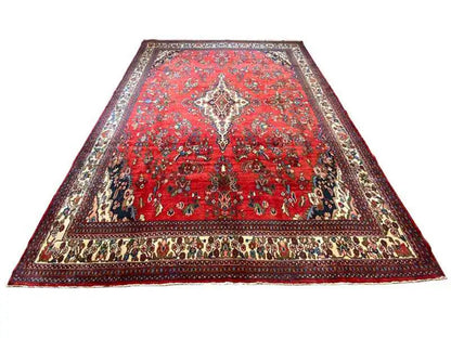 Hamadan carpet wider view: overall red design with border and central medallion