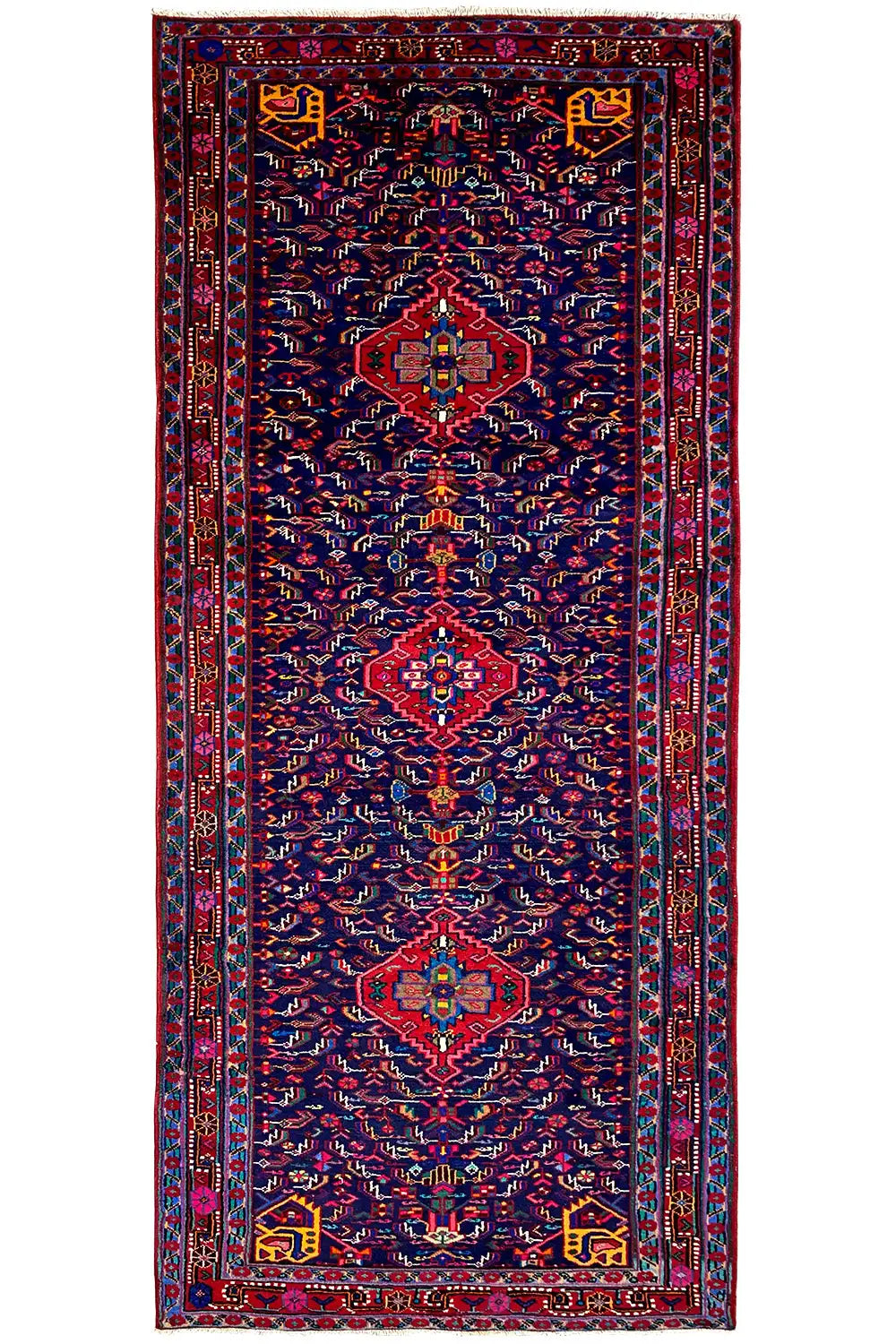 Oriental rug, rectangular, dark blue with red and yellow medallions, ornate borders