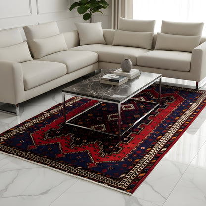 Sirjan runner rug laid flat with a red-and-blue ornamental pattern and border trim