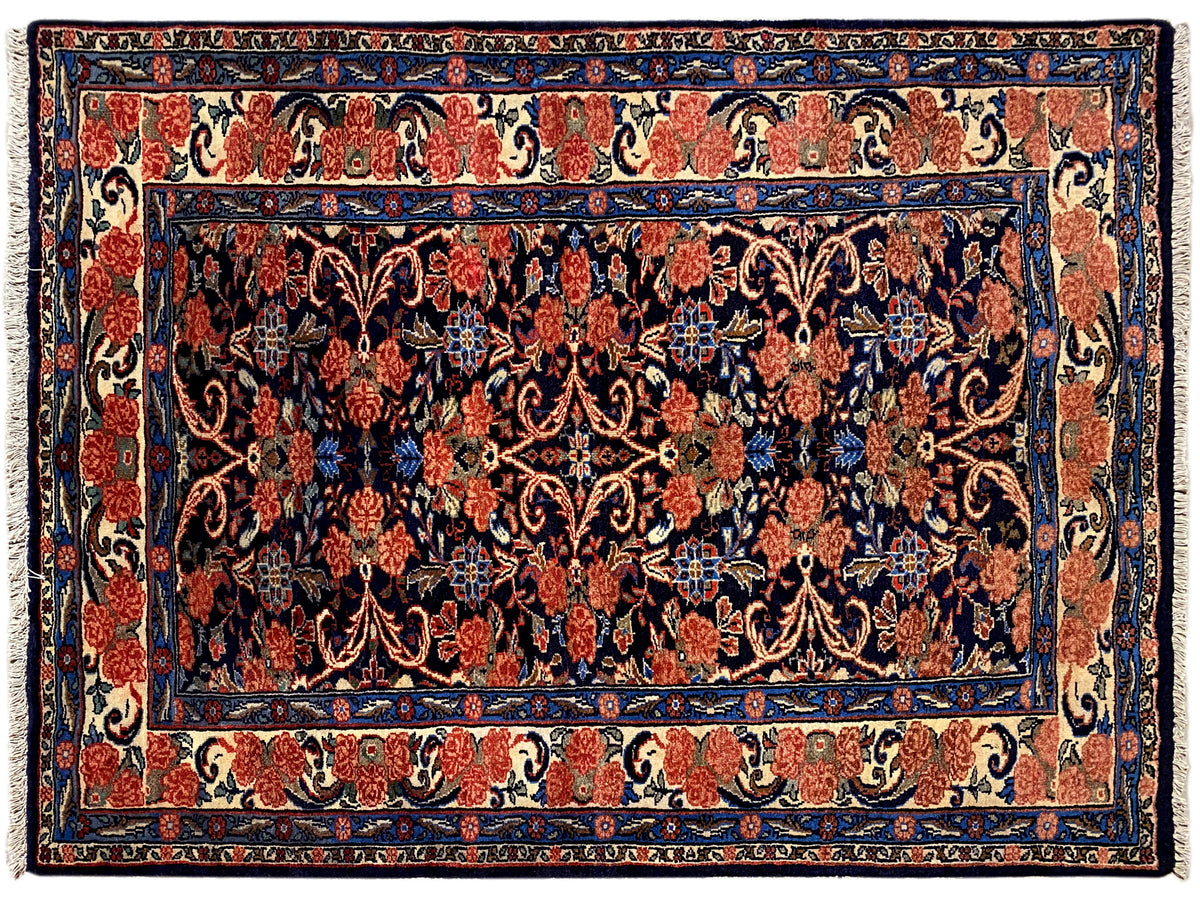 Carpet with a dense blue-red pattern in the central field and a wide border, 142×102 cm