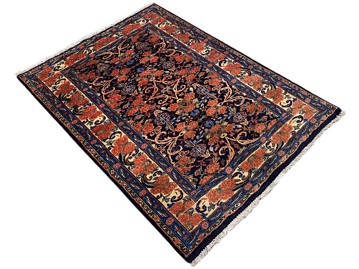 Slanted rug with blue-red ornaments and border, fine fringe, 142×102 cm